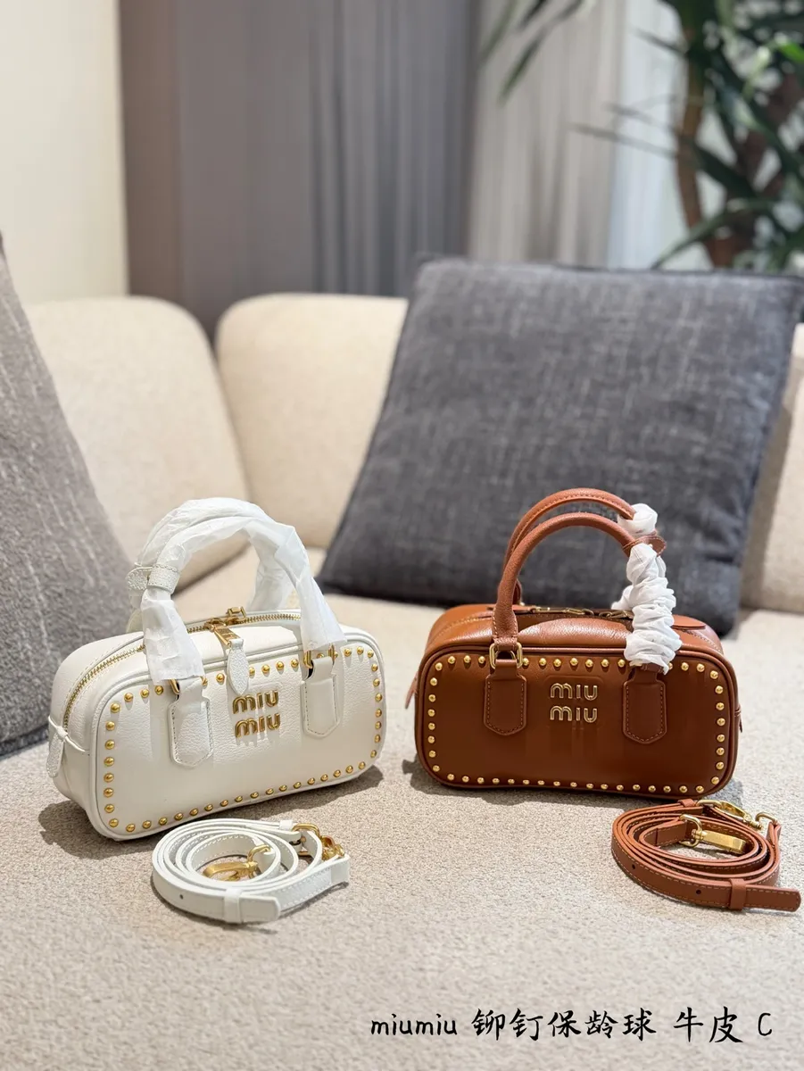 Miu Miu Studded Top Handle Bag — source photograph 1 of 3