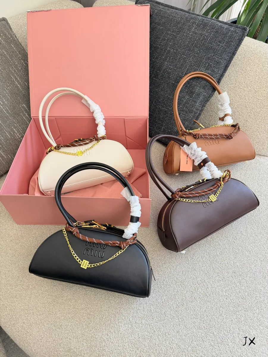 Miu Miu Woven Chain Top Handle Bag — source photograph 1 of 3
