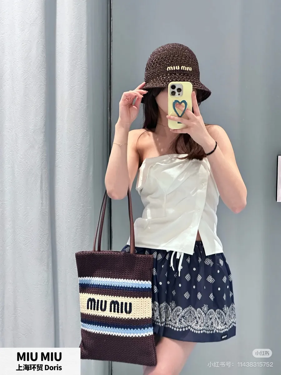Miu Miu Woven Tote Bag — source photograph 1 of 3