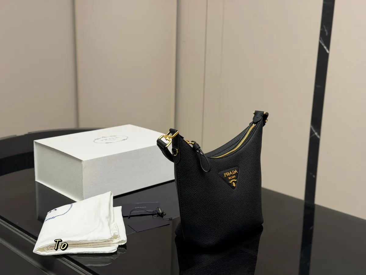 Prada Bucket Bag - 19 × 21 cm — source photograph 1 of 3