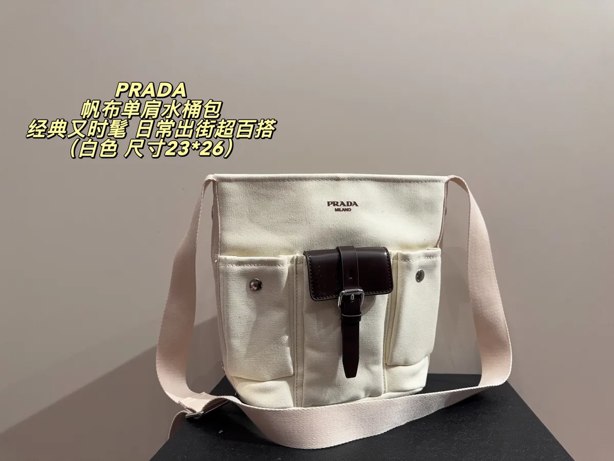 Prada Canvas Bucket Bag — source photograph 1 of 3