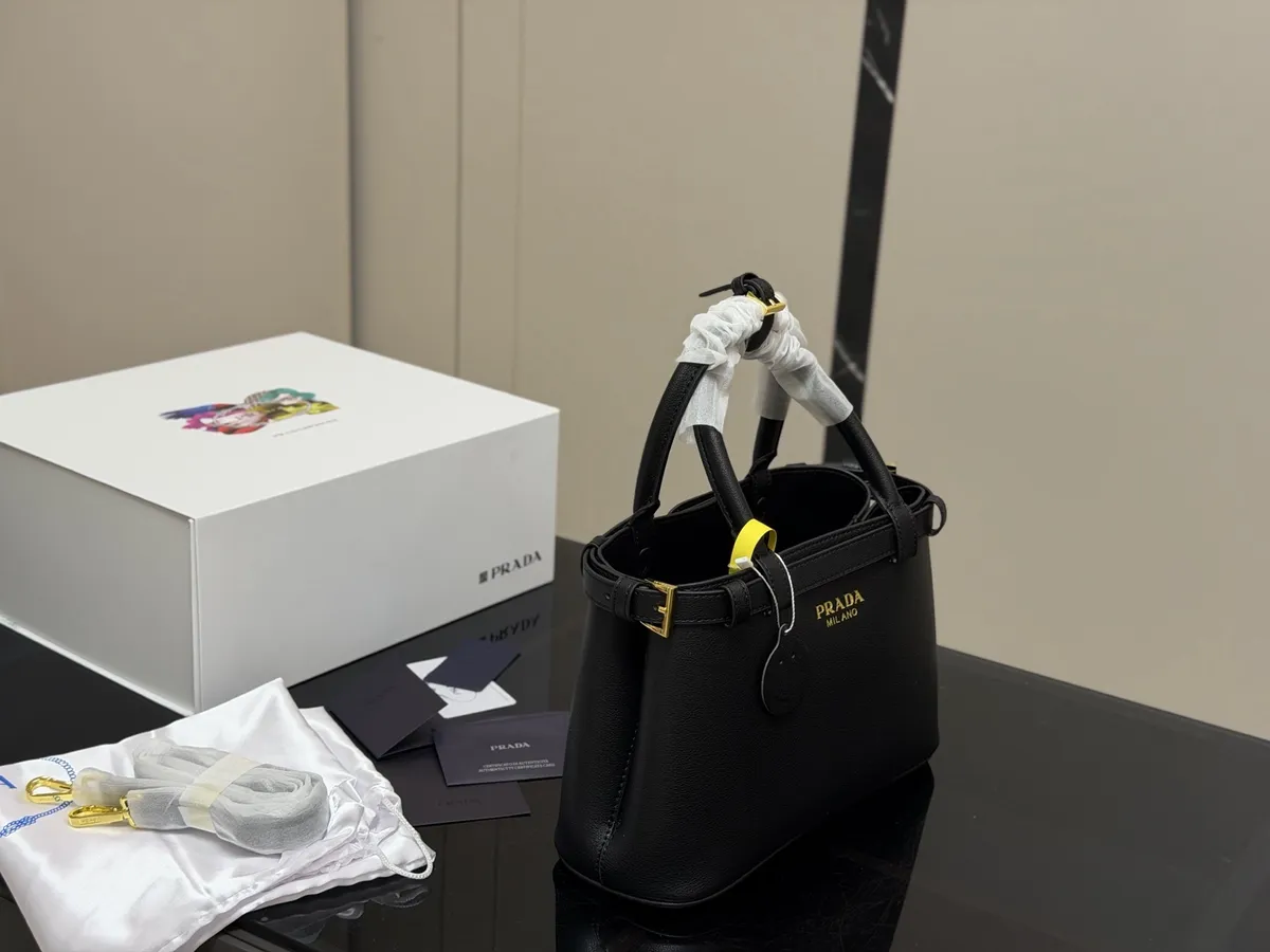 Prada Canvas Handbag - 28 × 18 cm — source photograph 1 of 3