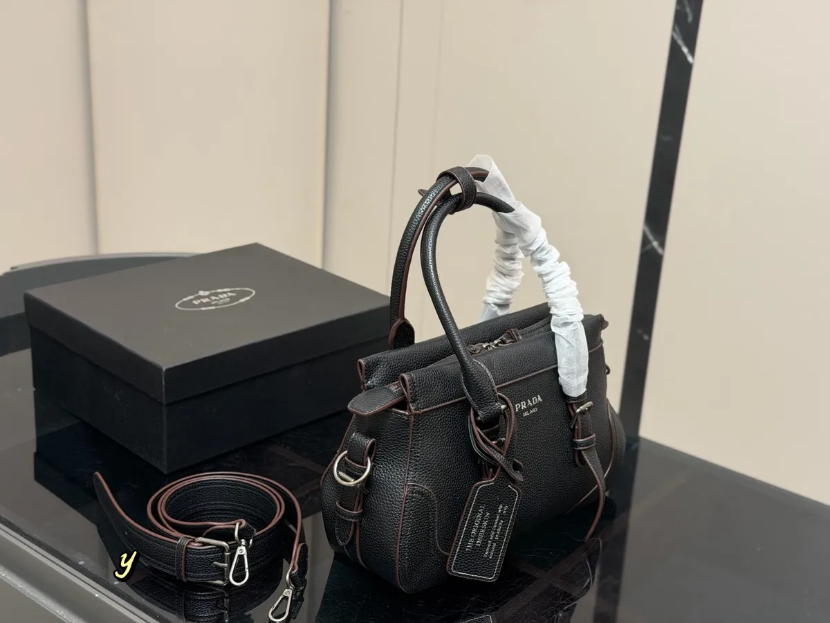 Prada Canvas Handbag - 31 × 20 cm — source photograph 1 of 3