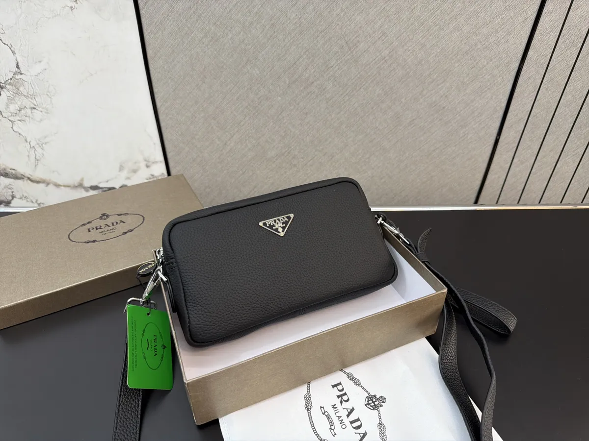 Prada Clutch Bag - 15 × 24 cm — source photograph 1 of 3