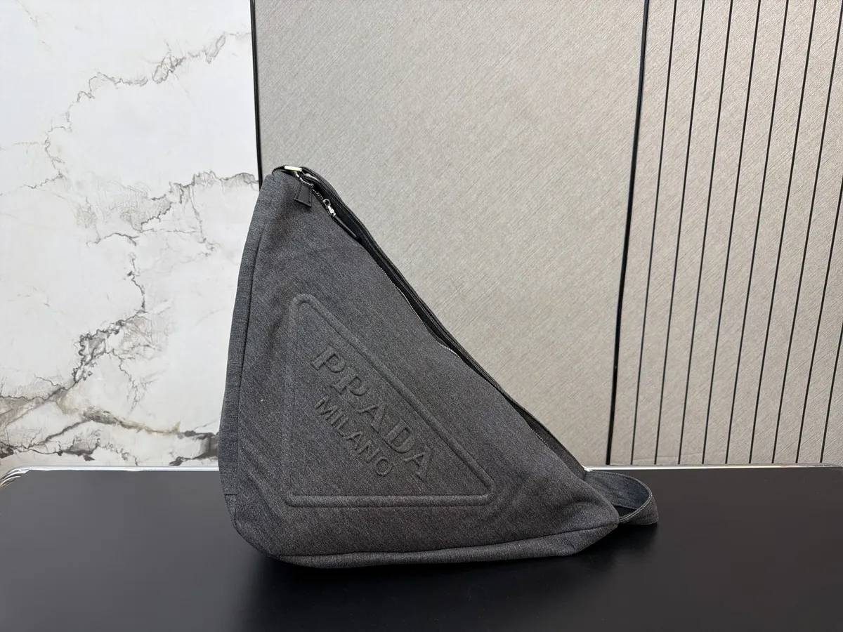 Prada Denim Crossbody Bag - 50 × 22 cm — source photograph 1 of 3