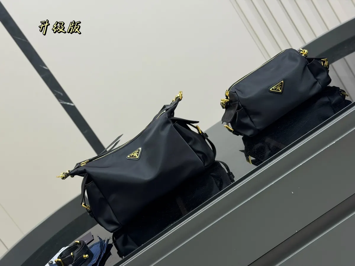 Prada Explore Nylon Messenger Bag - 31 × 18 cm Options — source photograph 1 of 3