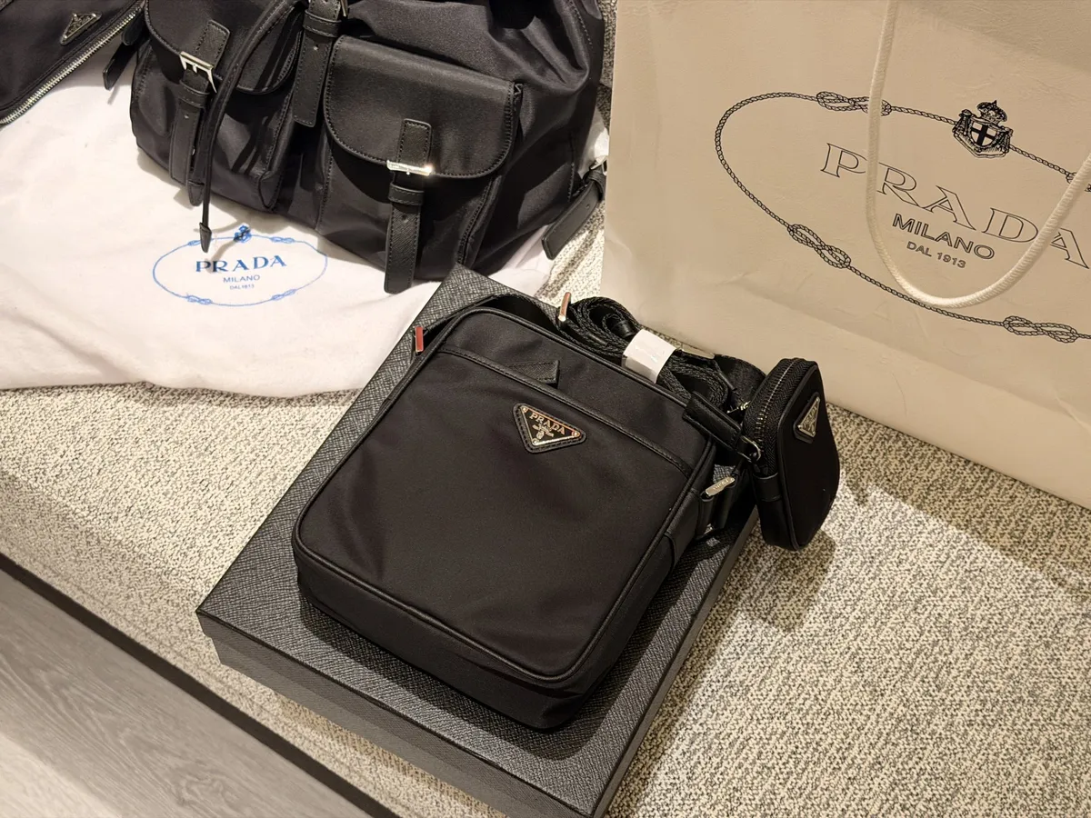 Prada Messenger Bag - 17 × 20 cm — source photograph 1 of 3