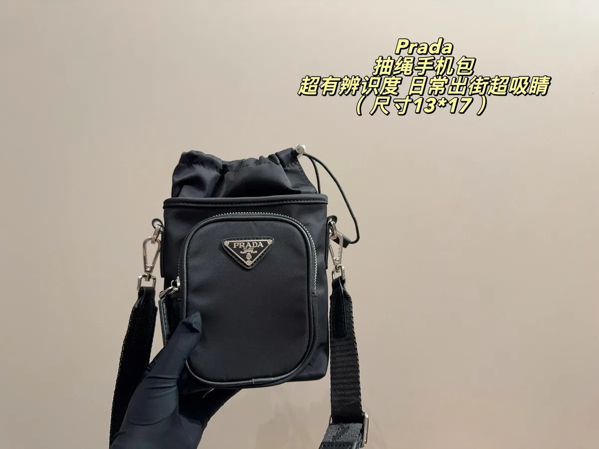 Prada Nylon Drawstring Crossbody Bag — source photograph 1 of 3