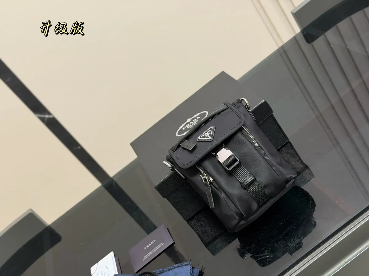 Prada Nylon Handbag - 14 × 18 cm — source photograph 1 of 3