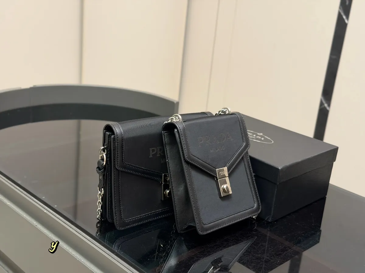 Prada Nylon Handbag - 16 × 19 cm Options — source photograph 1 of 3