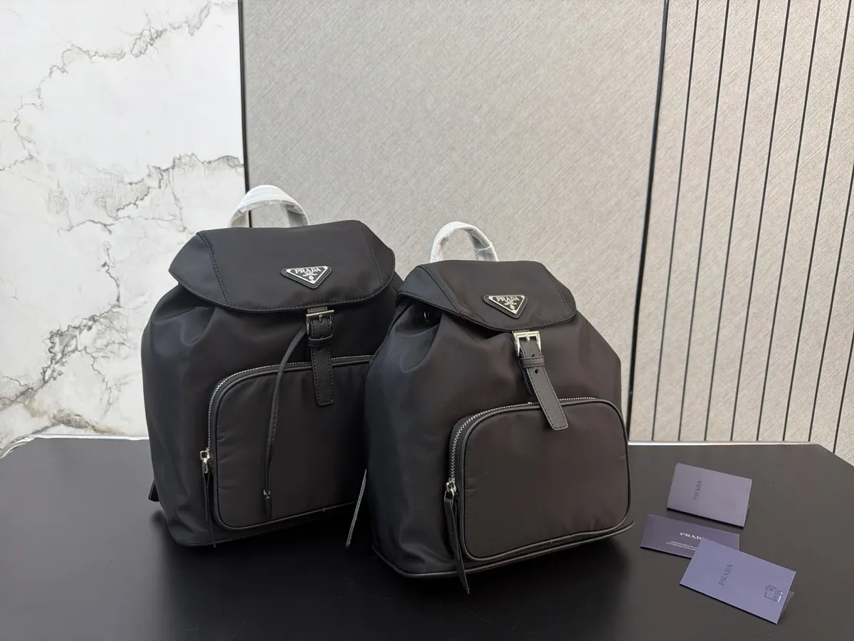 Prada Re-Nylon Backpack - 27 × 32 cm Options — source photograph 1 of 3