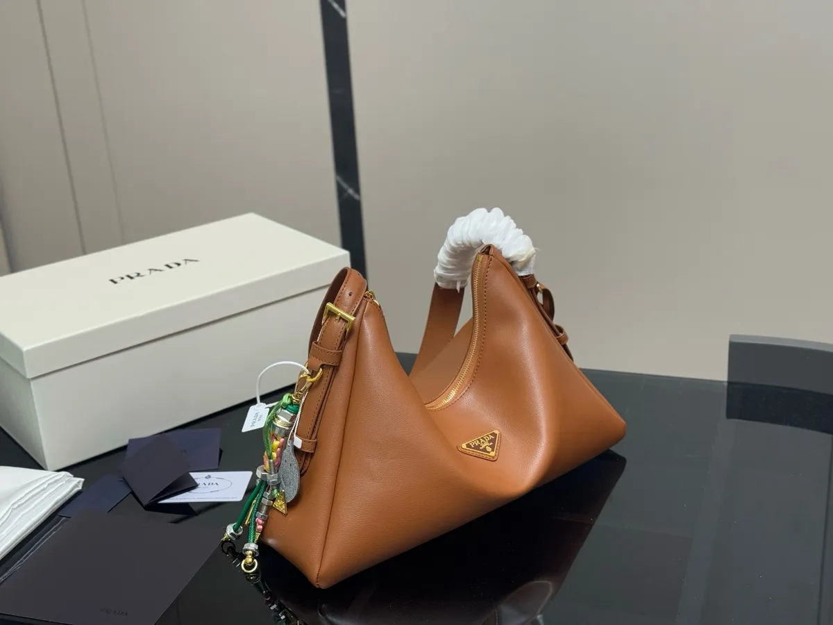 Prada Shoulder Bag - 37 × 24 cm — source photograph 1 of 3