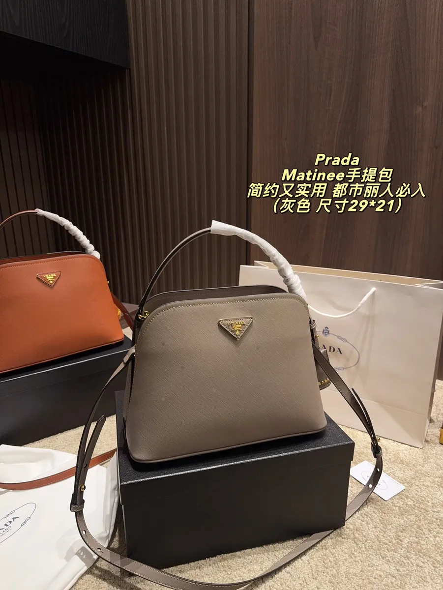 Prada Top Handle Bag — source photograph 1 of 3