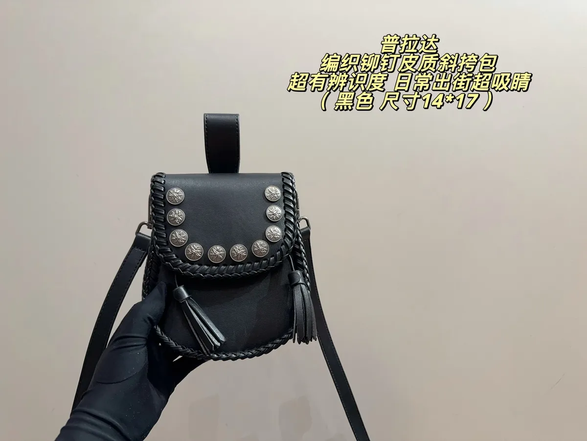 Prada Woven Studded Crossbody Bag — source photograph 1 of 3