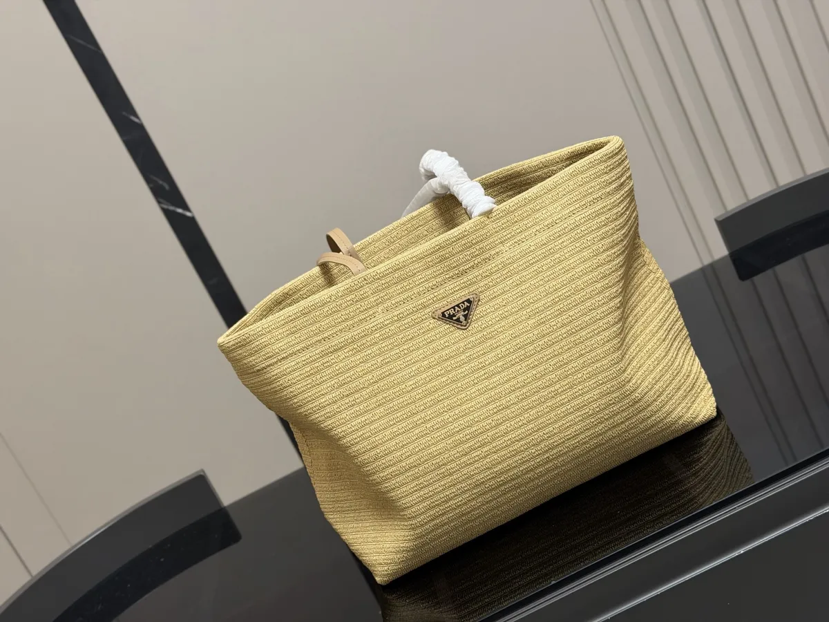 Prada Woven Tote Bag - 38 × 30 cm — source photograph 1 of 3