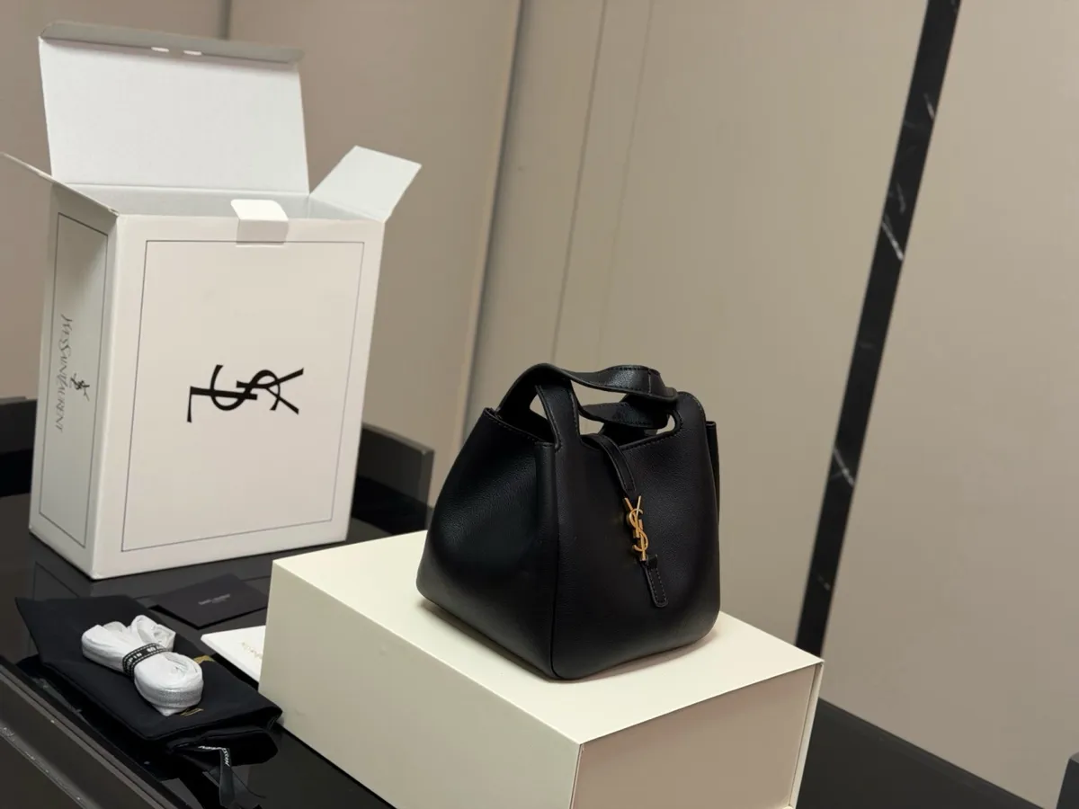 Saint Laurent Cassandre Openwork Bucket Bag - 18 × 17 cm — source photograph 1 of 3