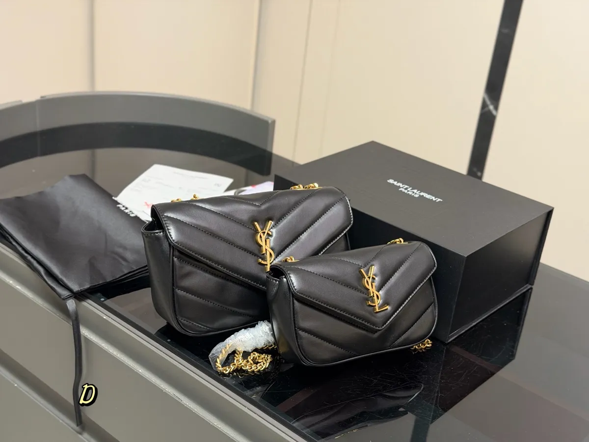 Saint Laurent Loulou Puffer Handbag - 24 × 15 cm Options — source photograph 1 of 3