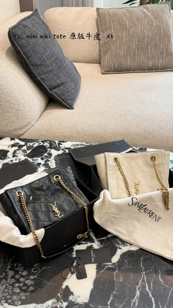 Saint Laurent Niki Denim Chain Tote Bag — source photograph 1 of 3