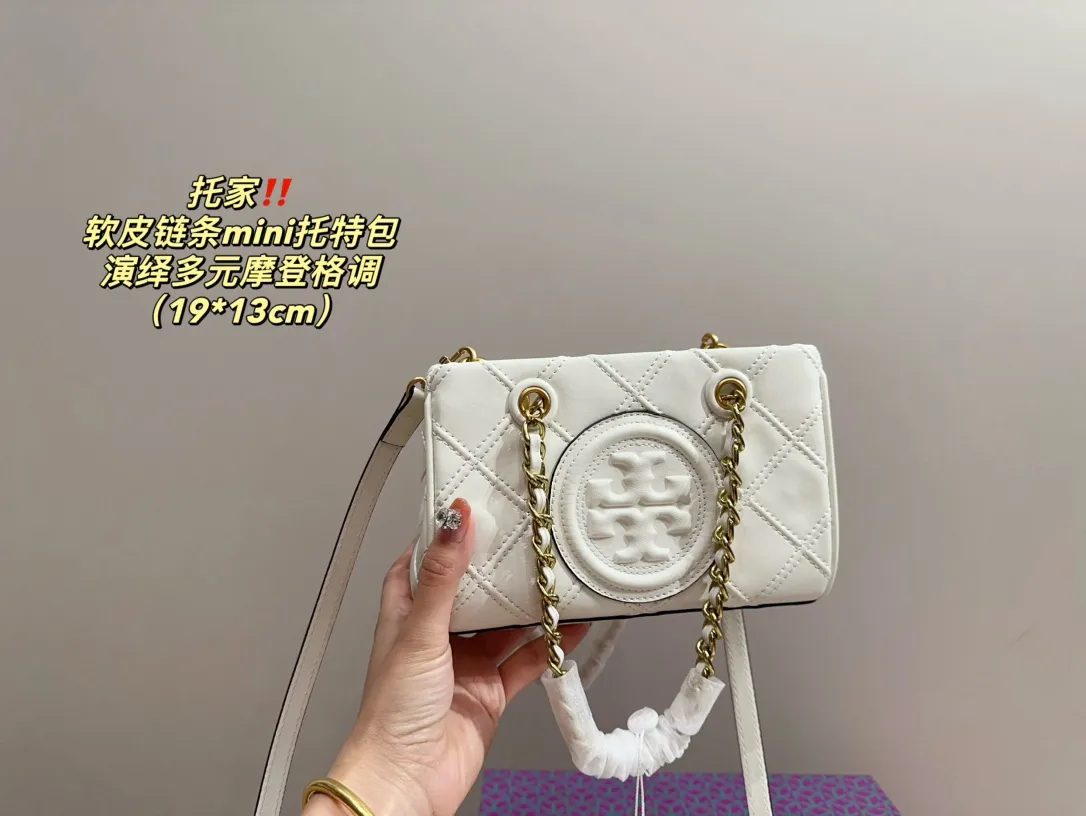 Tory Burch Denim Chain Tote Bag — source photograph 1 of 3
