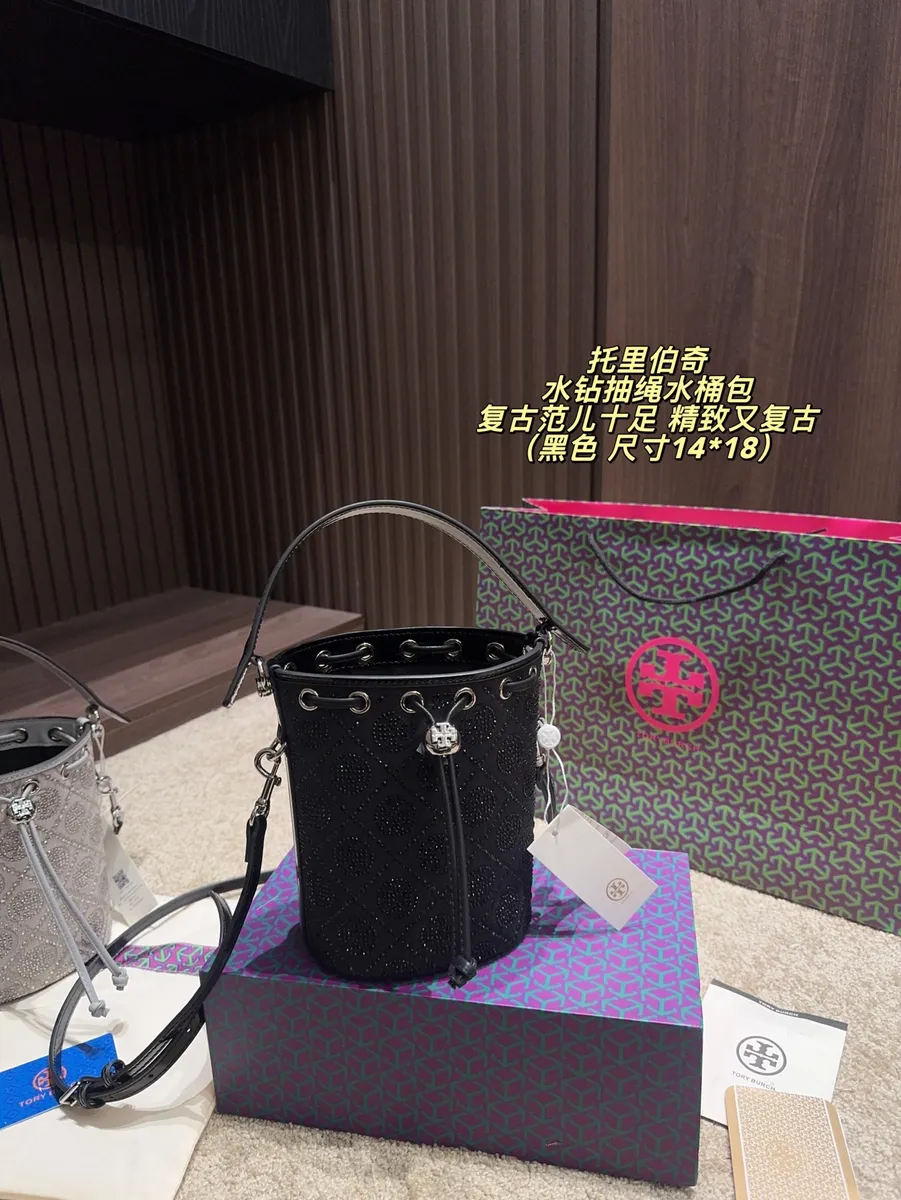 Tory Burch Denim Drawstring Bucket Bag — source photograph 1 of 3