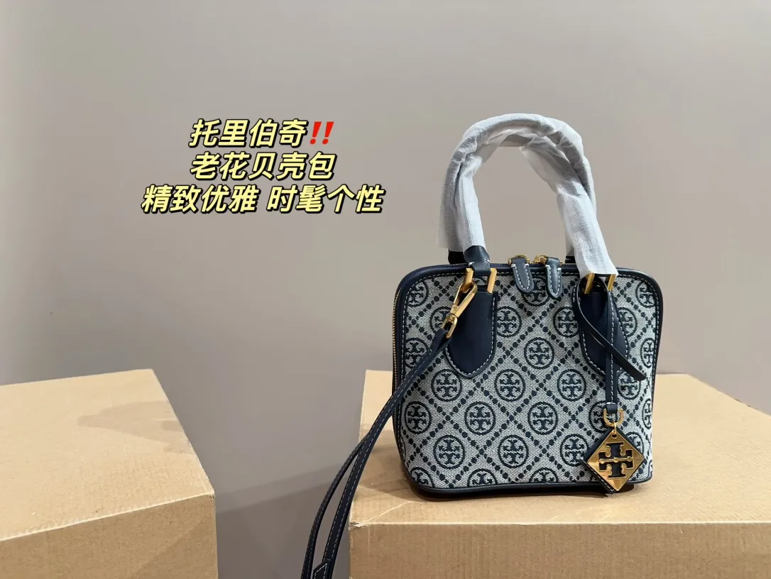 Tory Burch Monogram Handbag — source photograph 1 of 3