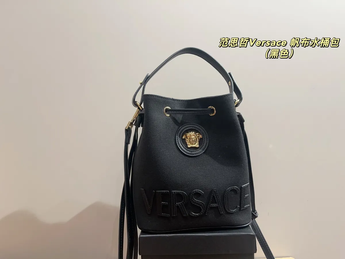 Versace Canvas Bucket Bag — source photograph 1 of 3